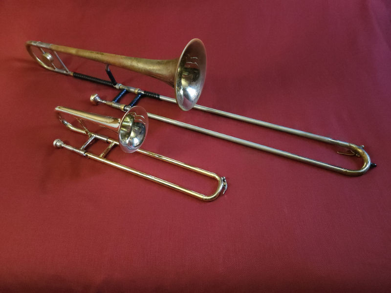 Slide trumpet and tenor trombone Comparison photo of a tenor trombone and slide trumpet together